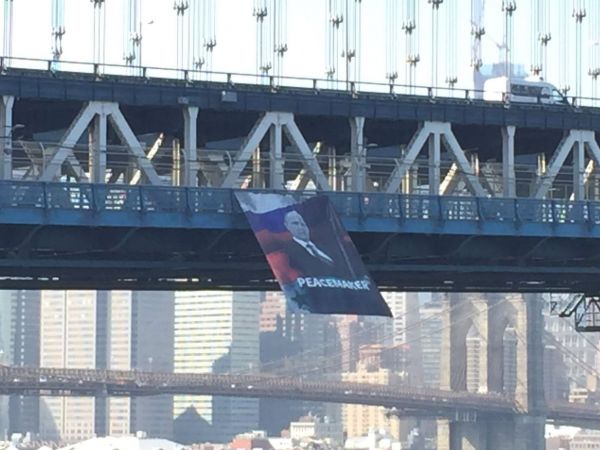 Banner with image of Putin hung from NYC bridge Banner with image of Putin hung from NYC bridge