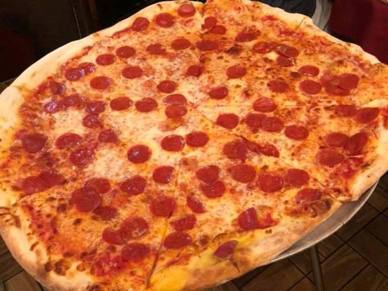 Home Of New Jersey's 'Largest Pizza Slices' Turns 50 In Hoboken