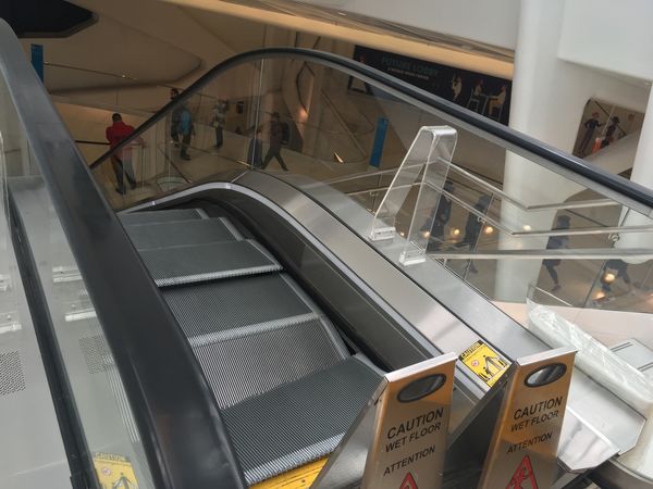WTC escalator steps buckle, 2 men suffer minor injuries