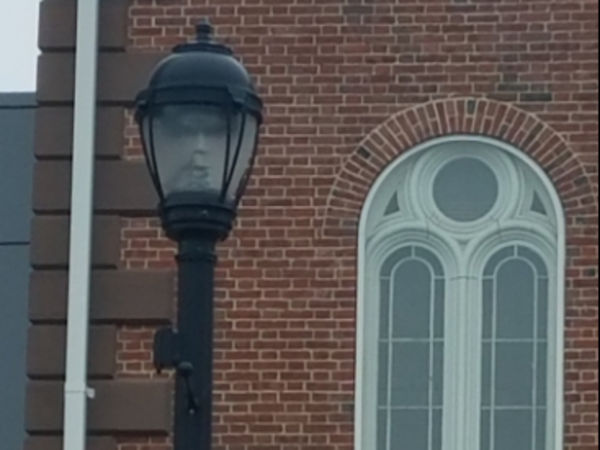 Mayor calls ghostly face seen in Salem streetlamp 'eerie'