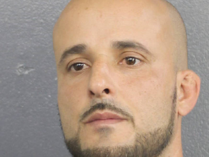 broward teen arrested set fire Gay erotic books