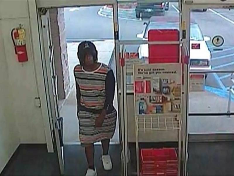 police search for male robbery suspect who dressed as woman