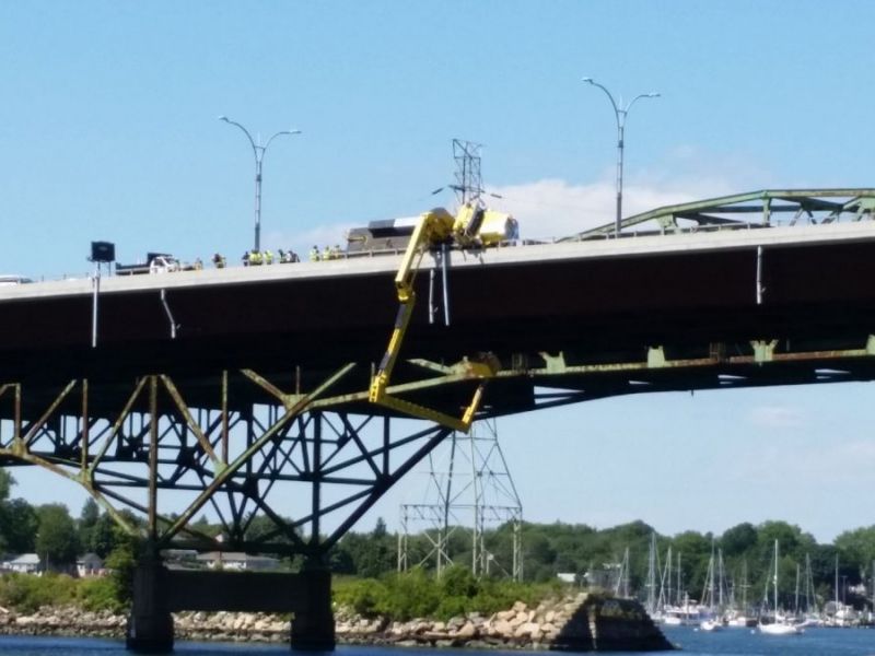 Workers Rescued from Bucket after Crane Overturns on Sakonnet River