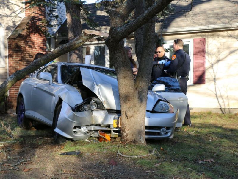 Car Hits Tree, Barely Misses Suffolk County Home, 2 Hurt Car Hits Tree, Barely Misses Suffolk County Home, 2 Hurt